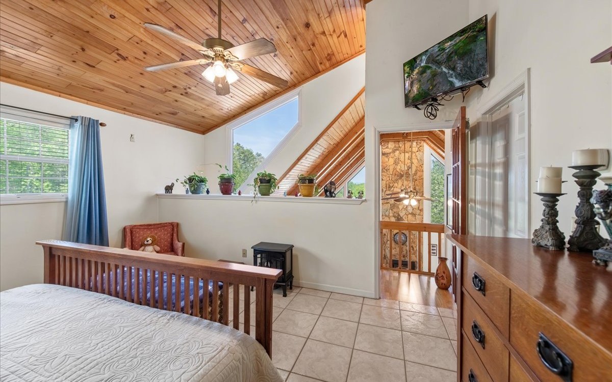 94 Mull Ln Circle Morganton, GA 30560 - Photo 34 of 67 a bedroom with furniture and a window