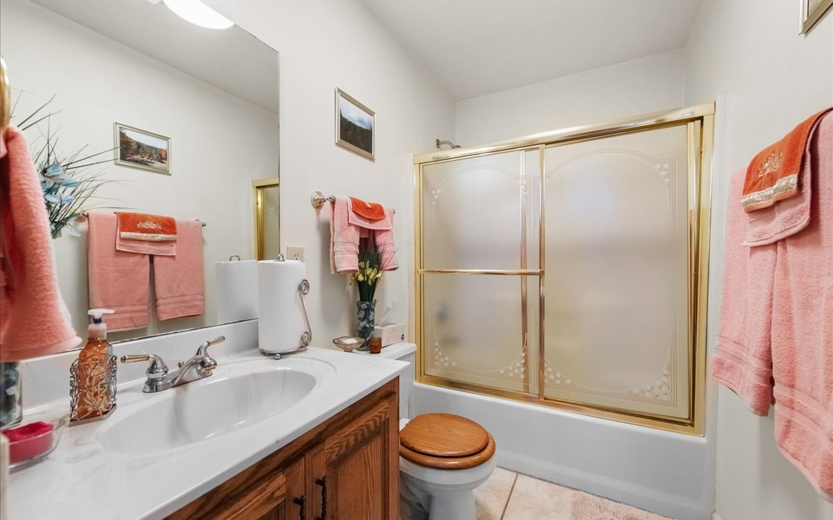 94 Mull Ln Circle Morganton, GA 30560 - Photo 39 of 67 a bathroom with a sink toilet and shower