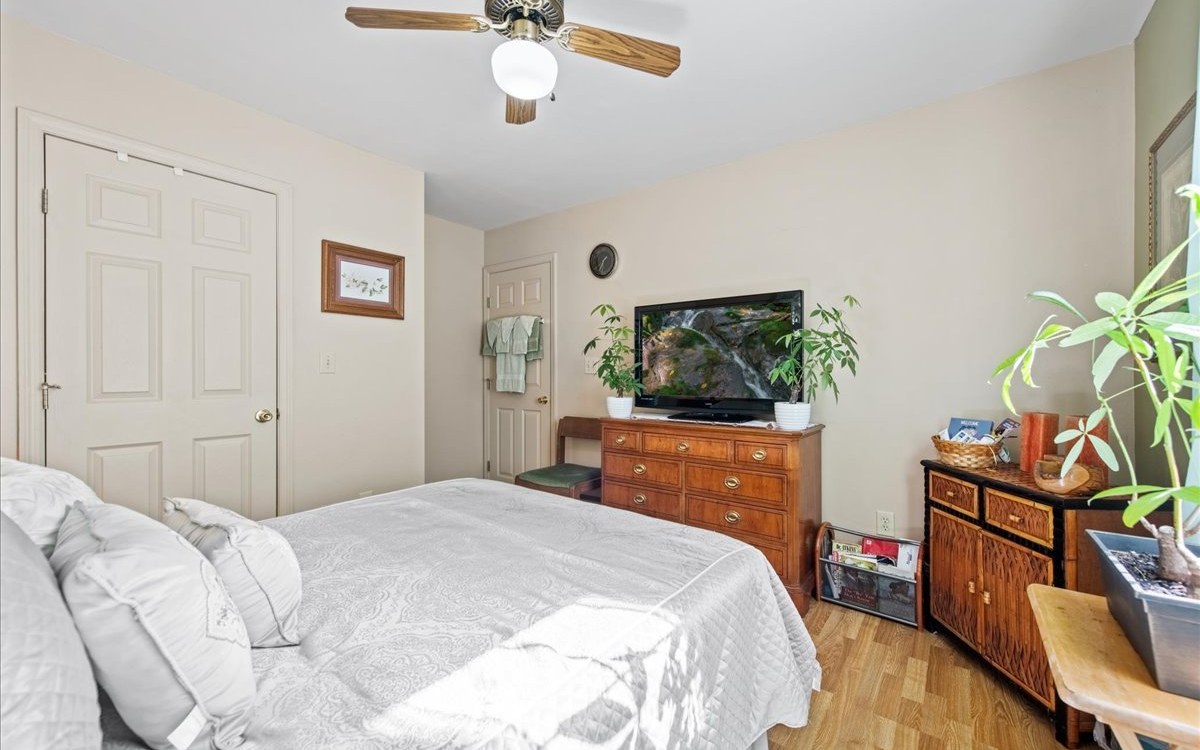 94 Mull Ln Circle Morganton, GA 30560 - Photo 41 of 67 a bedroom with a bed and a flat screen tv