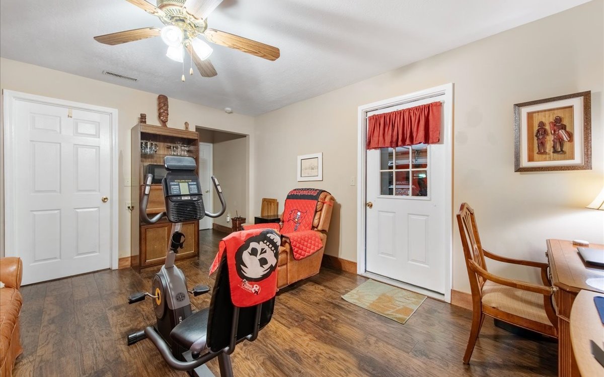 94 Mull Ln Circle Morganton, GA 30560 - Photo 44 of 67 a bedroom with furniture and a chandelier