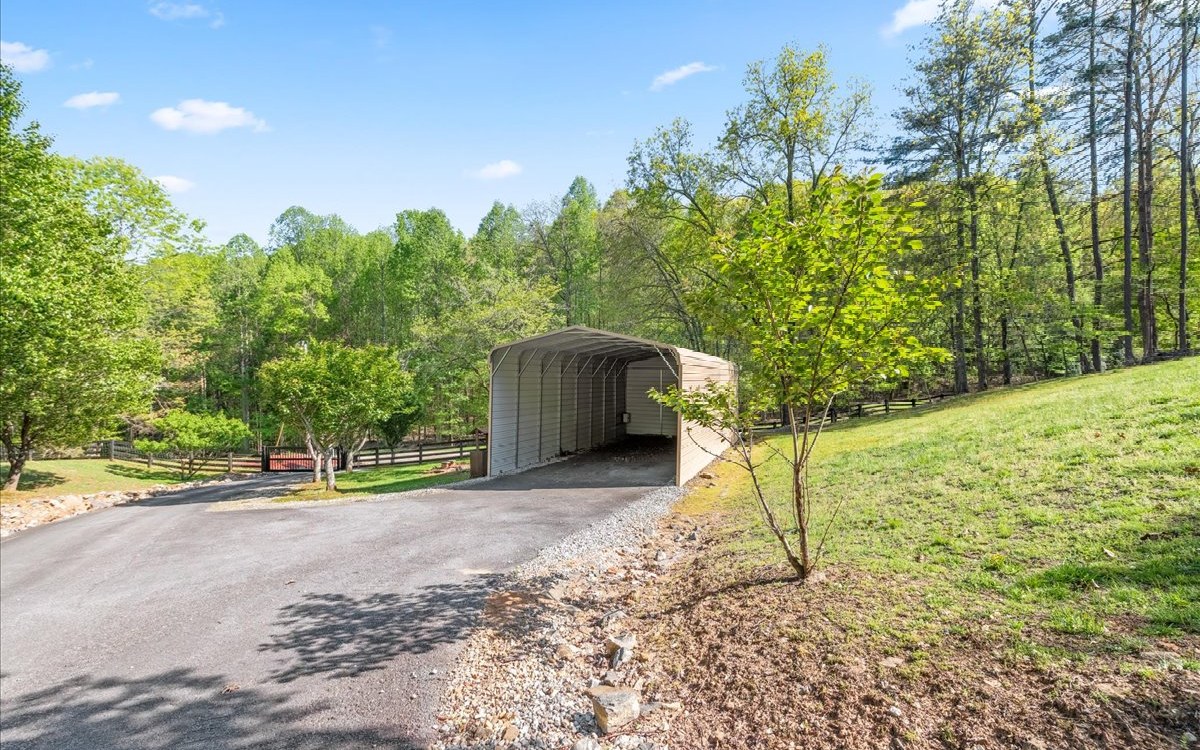 94 Mull Ln Circle Morganton, GA 30560 - Photo 51 of 67 a house with trees in the background