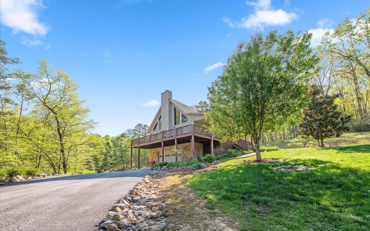 94 Mull Ln Circle Morganton, GA 30560 - Photo 54 of 67 a front view of a house with a yard