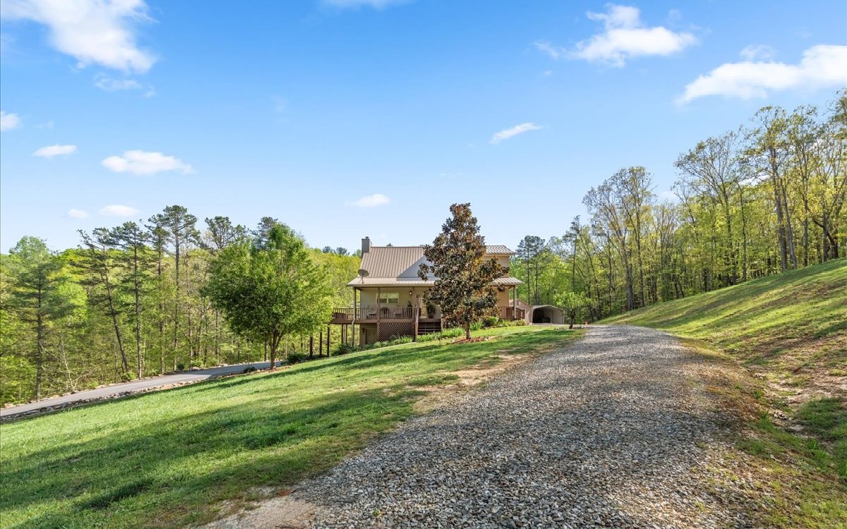 94 Mull Ln Circle Morganton, GA 30560 - Photo 64 of 67 a view of a field with trees in the background