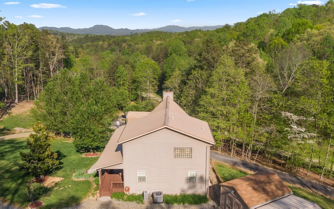 94 Mull Ln Circle Morganton, GA 30560 - Photo 7 of 67 a view of a house with a yard and mountain view