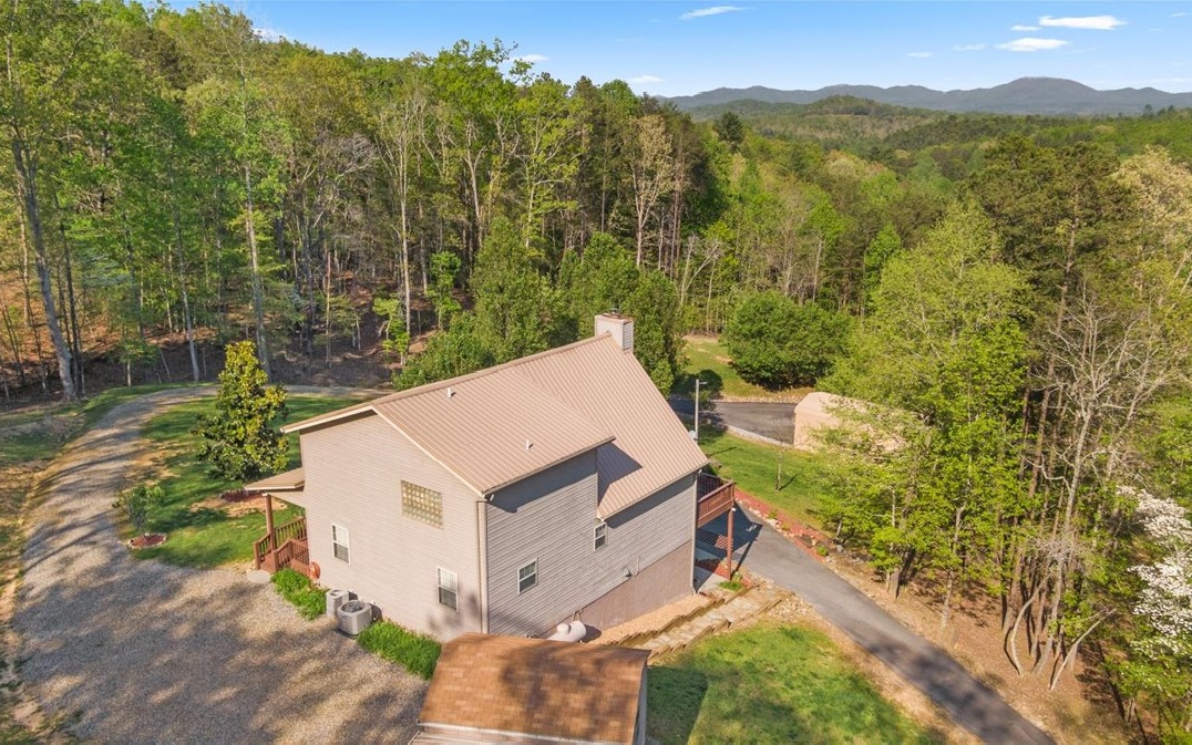 94 Mull Ln Circle Morganton, GA 30560 - Photo 8 of 67 a view of a house with a yard and mountain