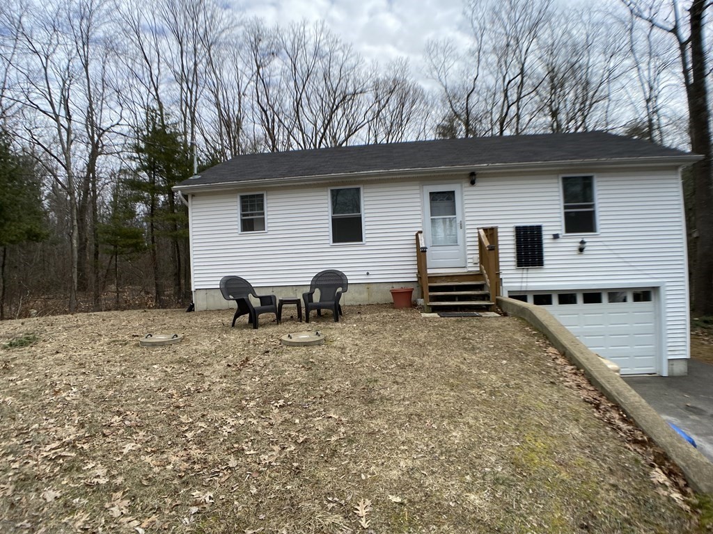 139 Union Road Wales, MA 01081 - Photo 1 of 15 a view of a house with backyard