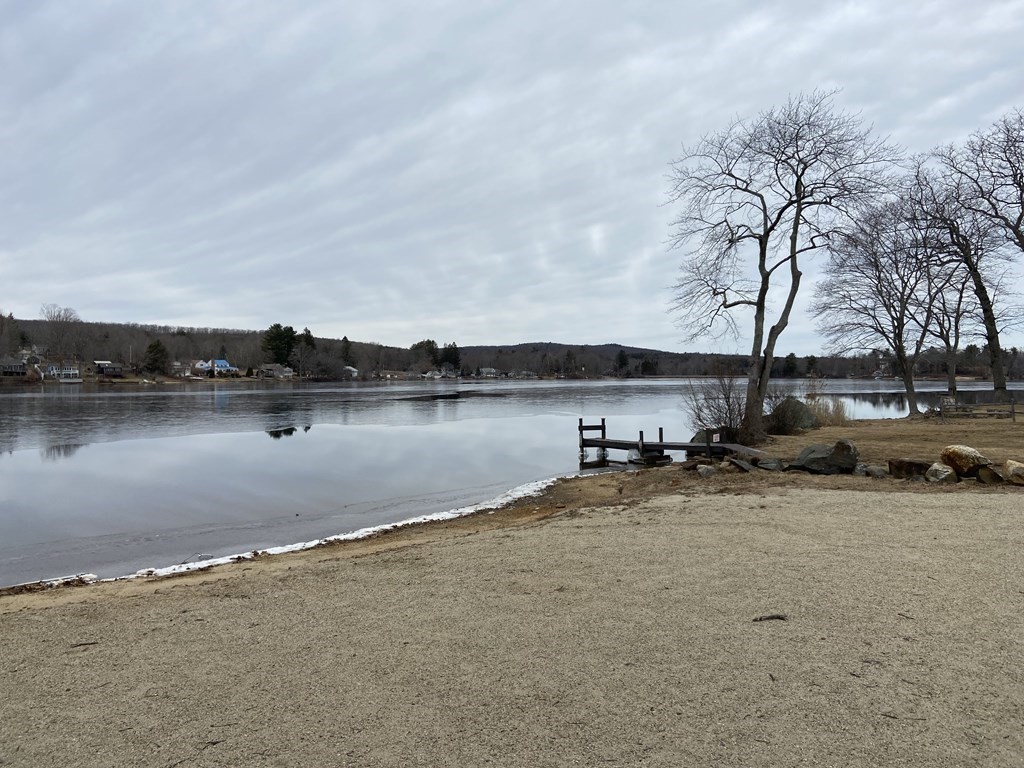 139 Union Road Wales, MA 01081 - Photo 14 of 15 a view of a lake with houses