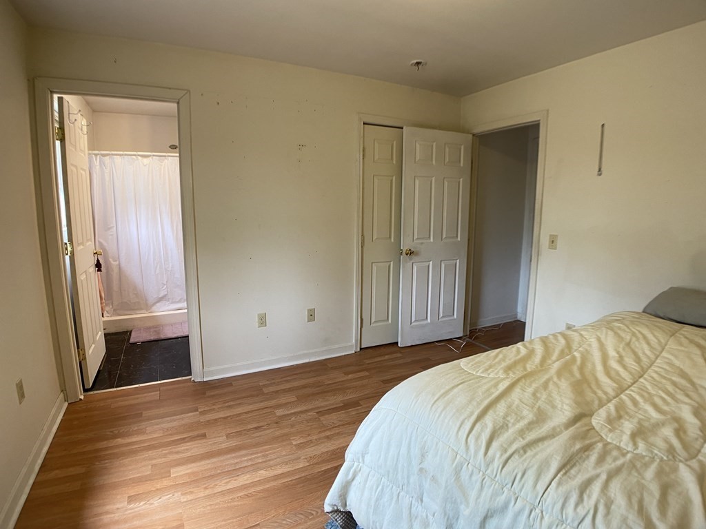 139 Union Road Wales, MA 01081 - Photo 9 of 15 a bedroom with a bed and a window