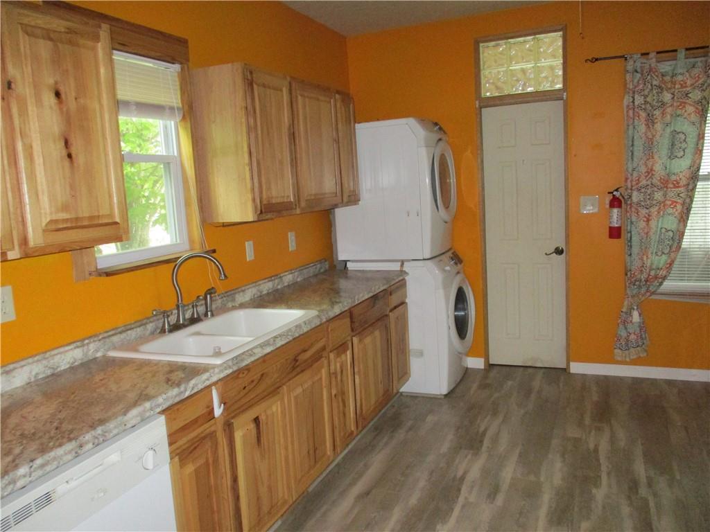 320 Main Street Lyndora, PA 16045 - Photo 6 of 11 a bathroom with a granite countertop sink and a mirror