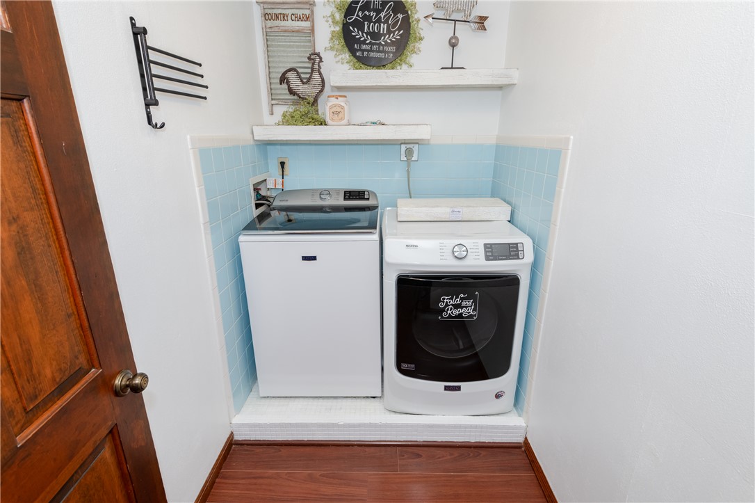 6750 Little Twin Road Germantown, OH 45327 - Photo 30 of 88 This dedicated laundry area offers practical convenience with essential appliances.