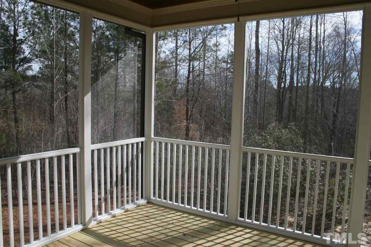 8605 Hurst Drive Raleigh, NC 27603 - Photo 5 of 17 a view of a wooden balcony