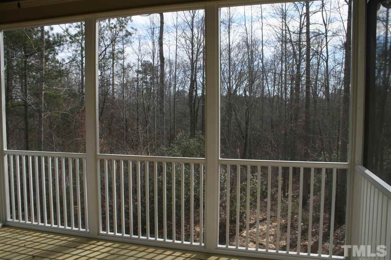 8605 Hurst Drive Raleigh, NC 27603 - Photo 6 of 17 a view of a wooden balcony