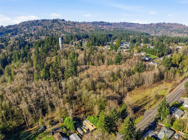 an aerial view of residential house and green space