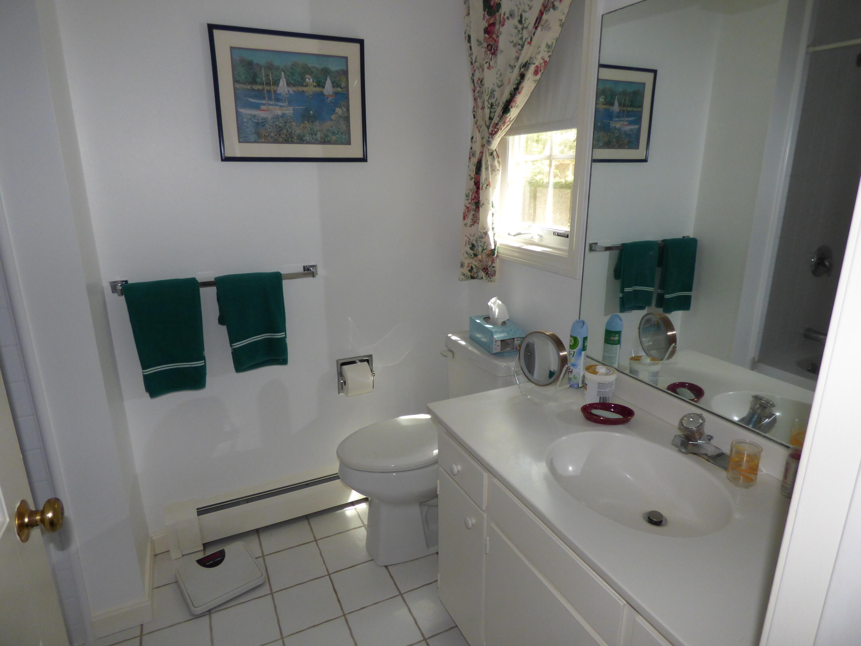1415 Old Post Road Marstons Mills, MA 02648 - Photo 14 of 28 a bathroom with a sink mirror and toilet