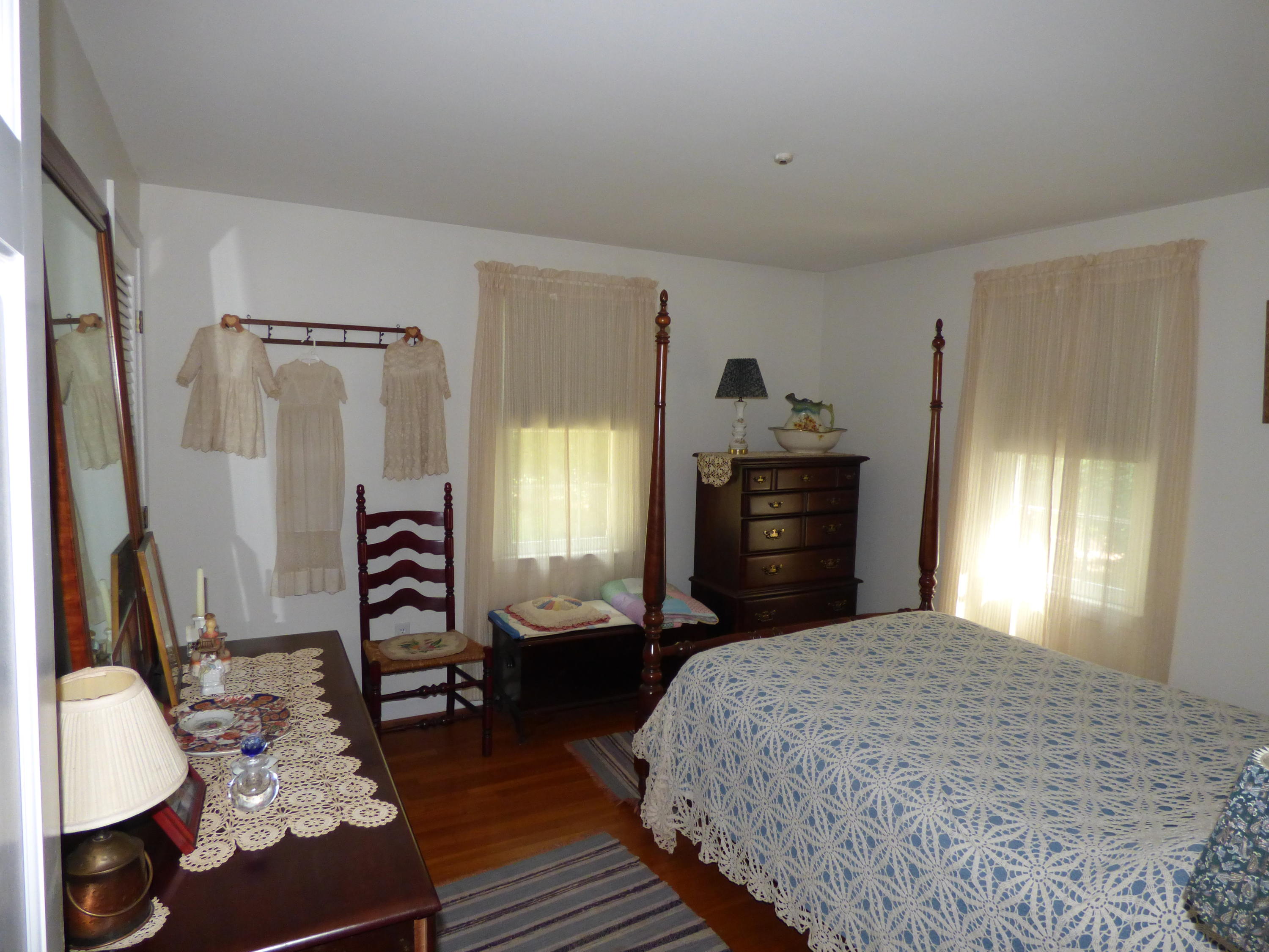 1415 Old Post Road Marstons Mills, MA 02648 - Photo 15 of 28 a bedroom with a bed dresser and a window