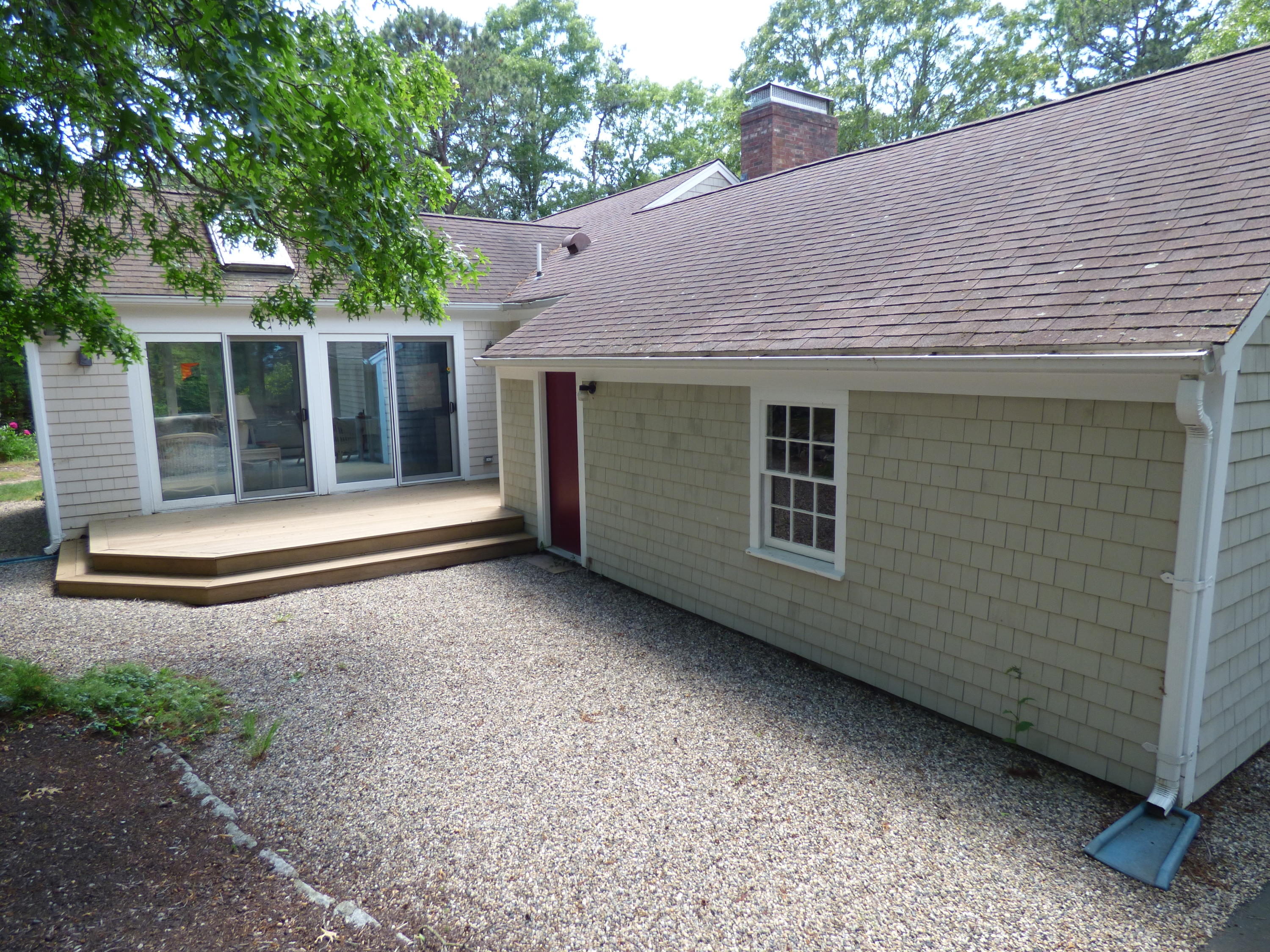1415 Old Post Road Marstons Mills, MA 02648 - Photo 19 of 28 a house with a outdoor space