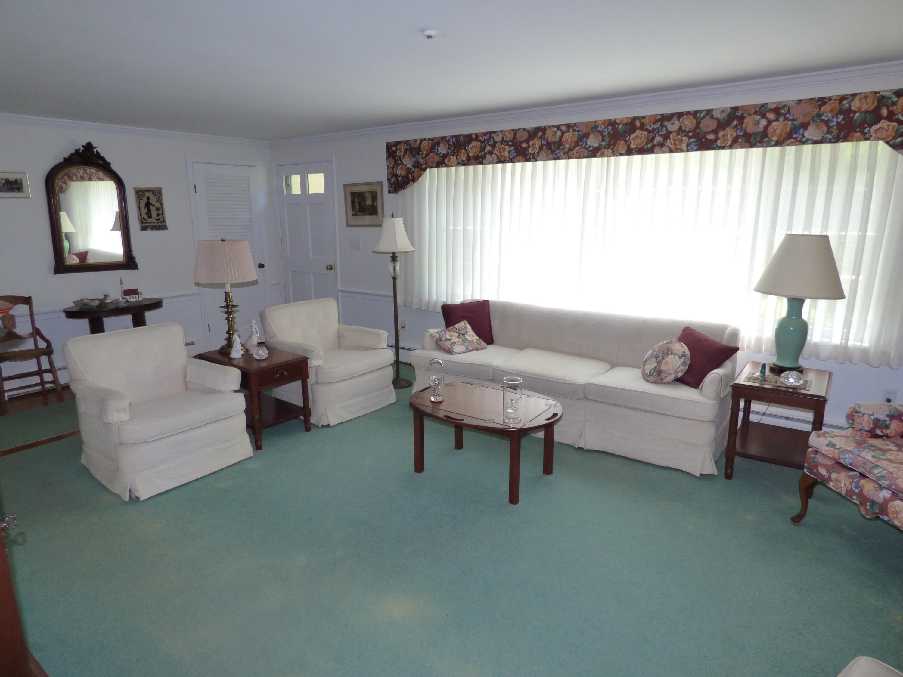 1415 Old Post Road Marstons Mills, MA 02648 - Photo 5 of 28 a living room with furniture and a mirror