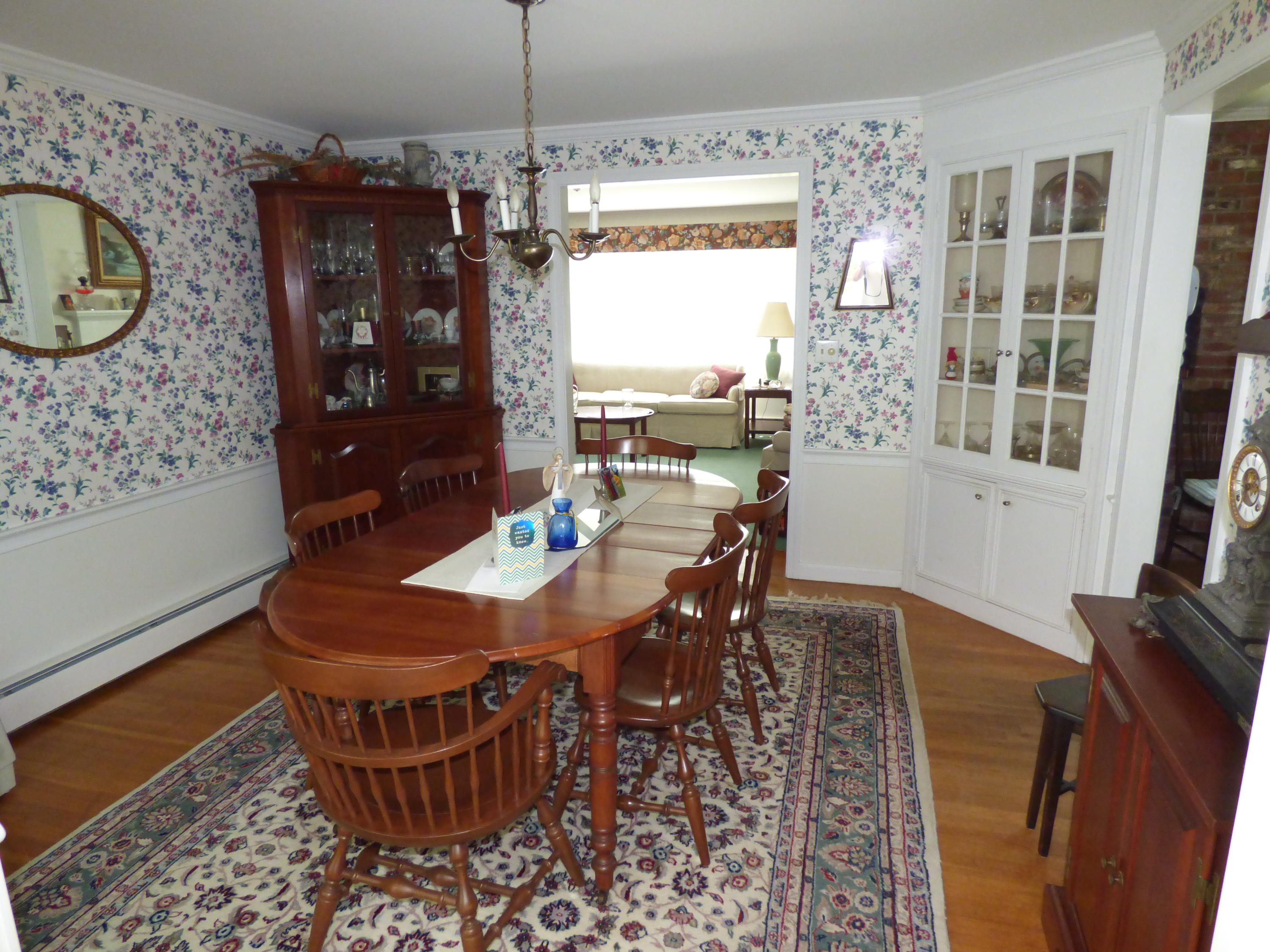 1415 Old Post Road Marstons Mills, MA 02648 - Photo 7 of 28 a view of a dining room with furniture window and wooden floor