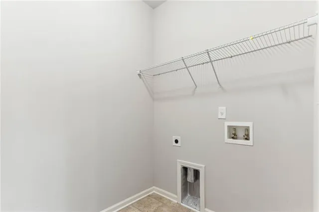 a view of small space with empty racks on the wall