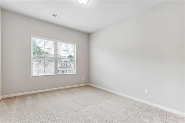 an empty room with a window