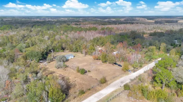 a view of a lake from a yard