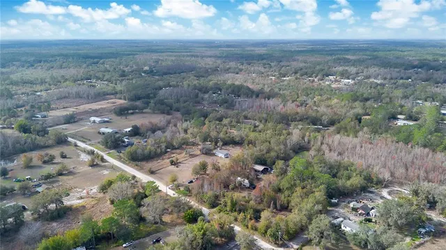 a view of a yard with an outdoor space