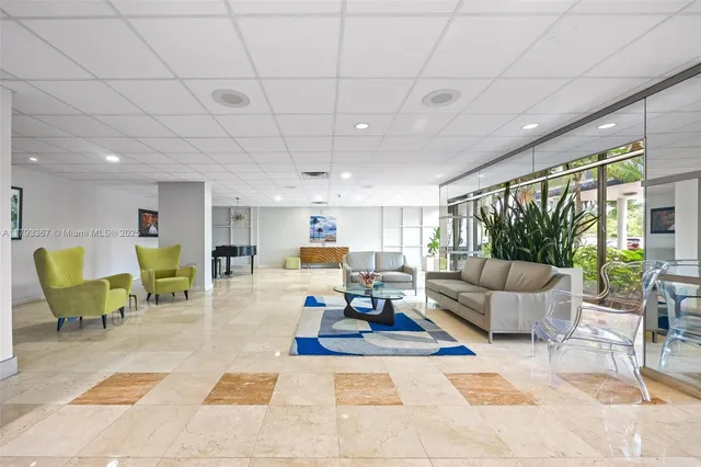 a living room with furniture and a table