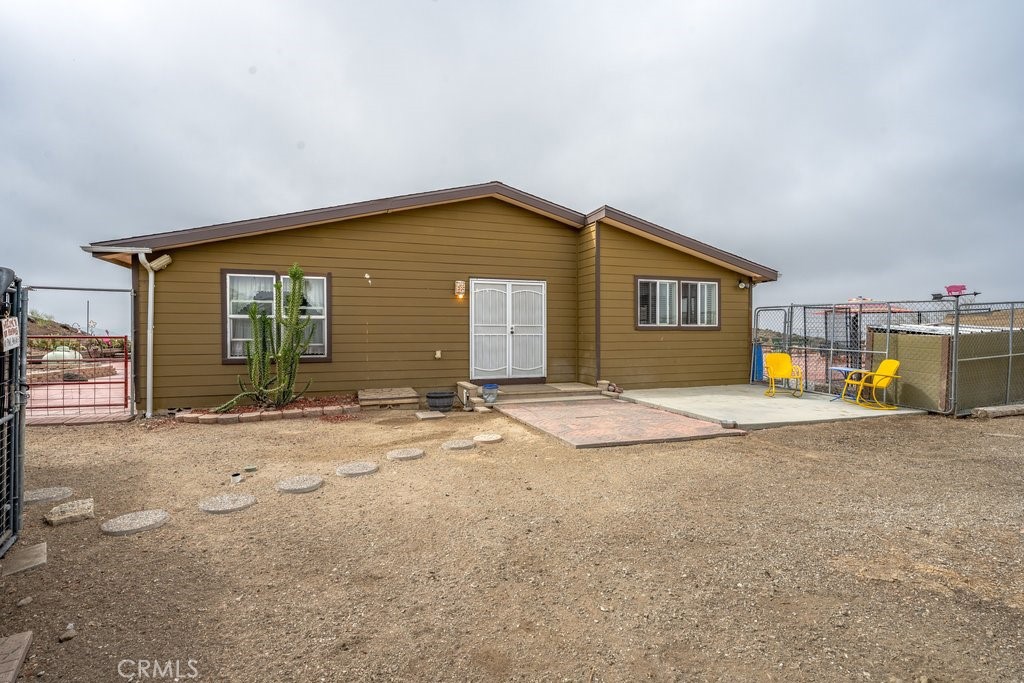 33330 Palen Road Agua Dulce, CA 91390 - Photo 3 of 56 a view of a house with basketball court