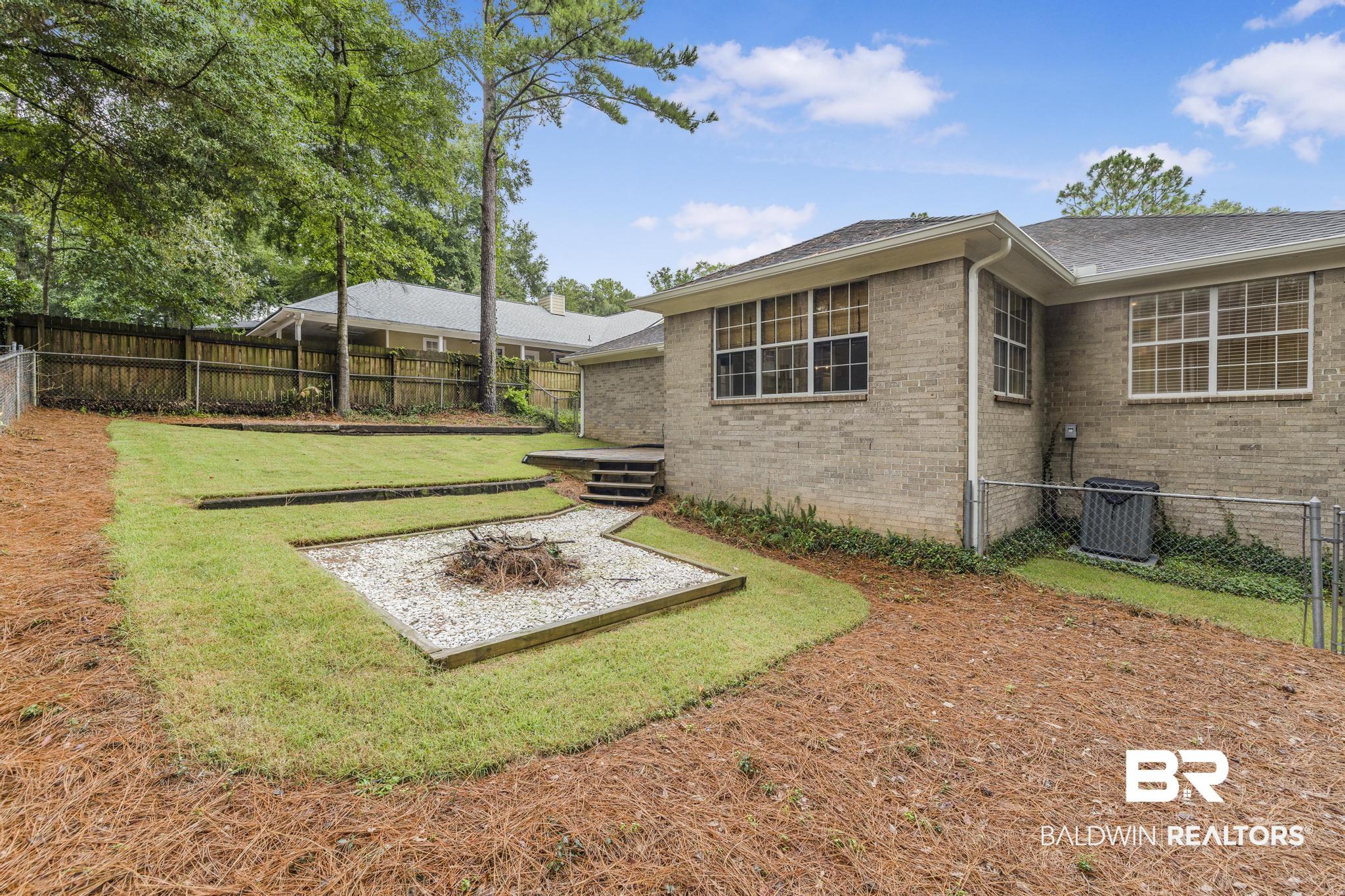 140 Hope Drive Daphne, AL 36526 - Photo 29 of 54 View of fenced backyard