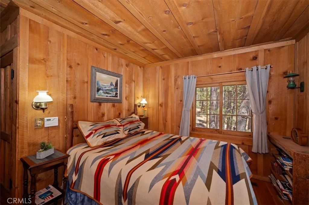 22 Polique Canyon Road Fawnskin, CA 92333 - Photo 16 of 42 Original wood bedroom