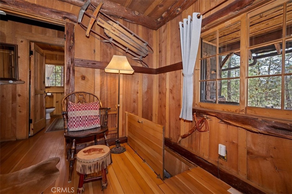 22 Polique Canyon Road Fawnskin, CA 92333 - Photo 9 of 42 Access to lower rooms through the living room,