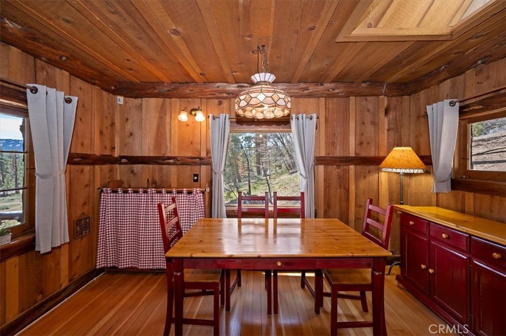 22 Polique Canyon Road Fawnskin, CA 92333 - Photo 10 of 42 Dining area with storage