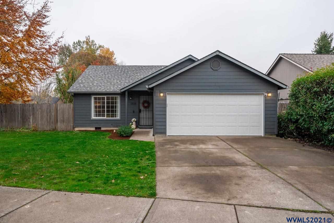 1206 Briar Road Independence, OR 97351 - Photo 1 of 38 a front view of house with yard and green space