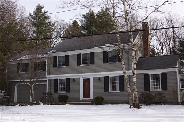 a view of a house with a street