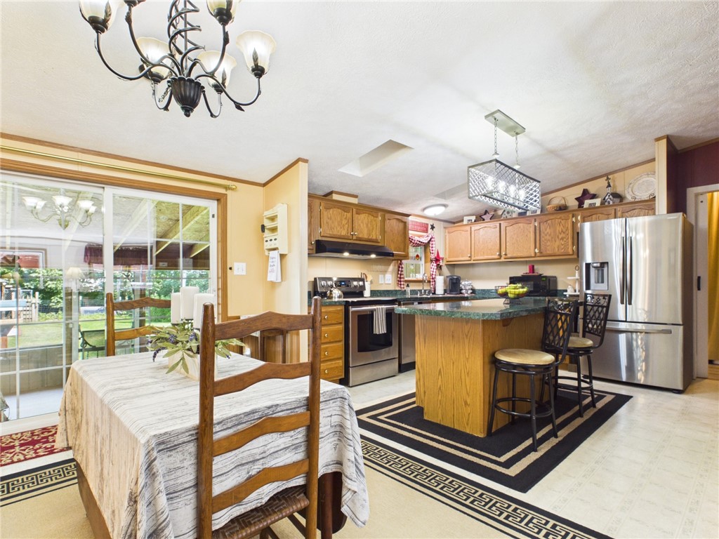 87 Collins Road Lewis Run, PA 16738 - Photo 3 of 48 Eat-in kitchen with access to screened in patio fr