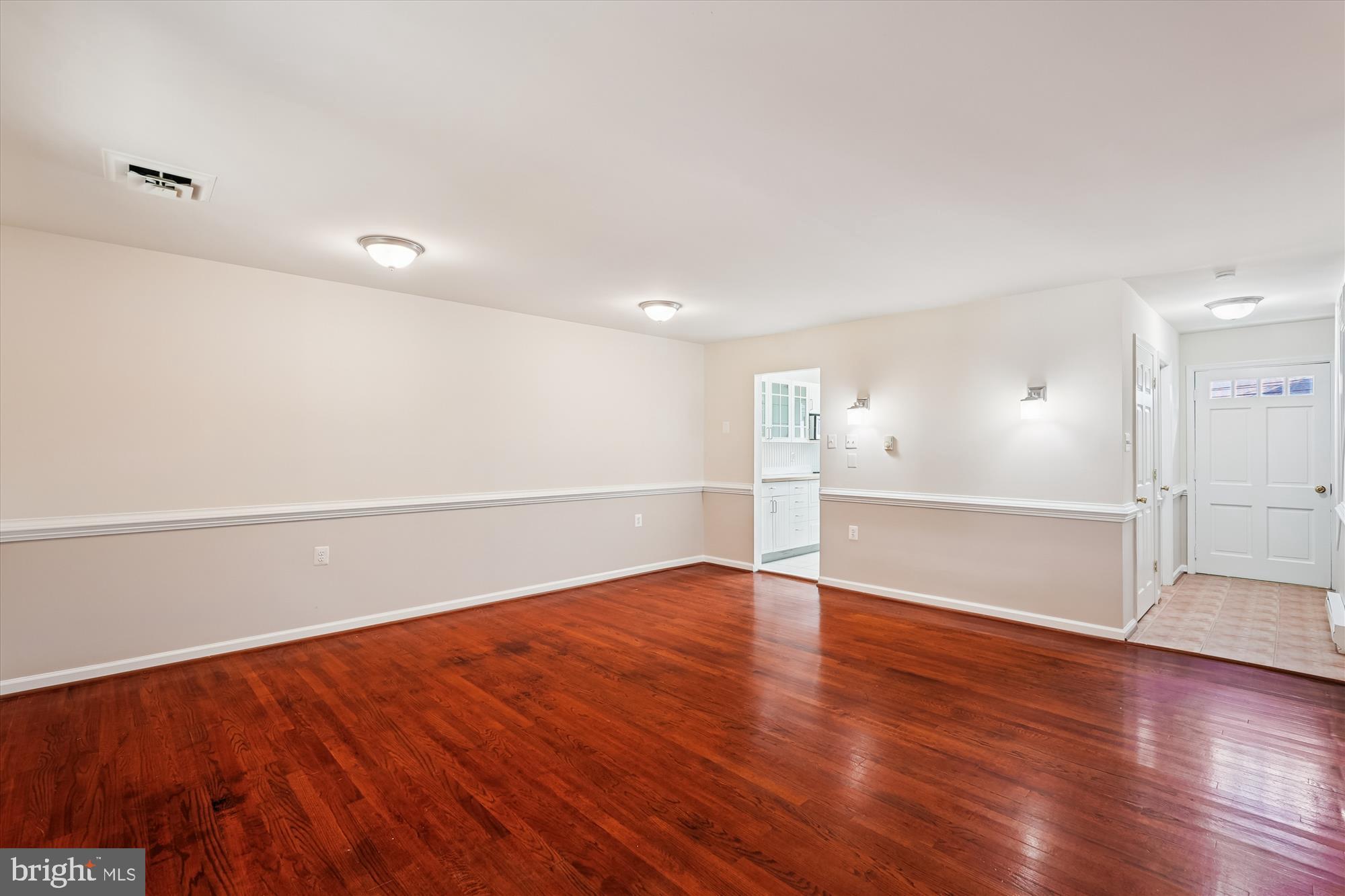 227 Dry Mill Road Southwest Leesburg, VA 20175 - Photo 15 of 38 a view of an empty room with wooden floor