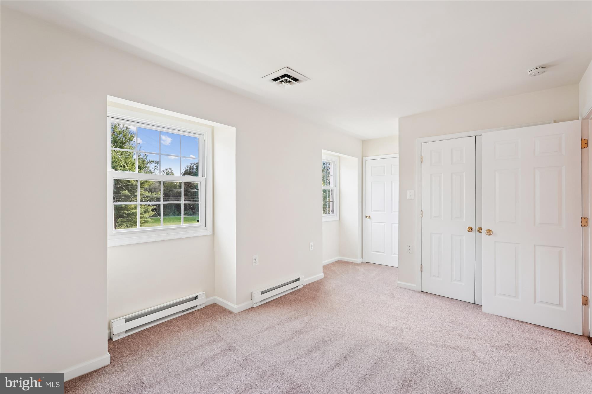 227 Dry Mill Road Southwest Leesburg, VA 20175 - Photo 16 of 38 an empty room with windows