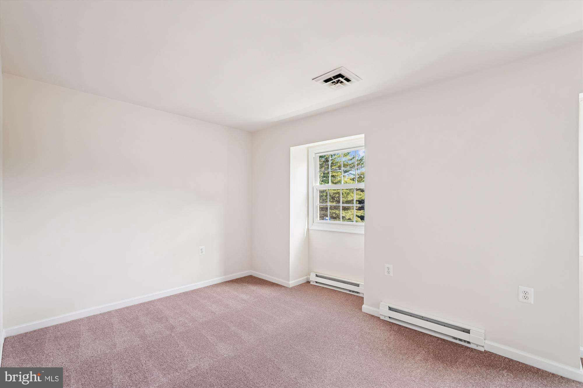 227 Dry Mill Road Southwest Leesburg, VA 20175 - Photo 18 of 38 an empty room with windows
