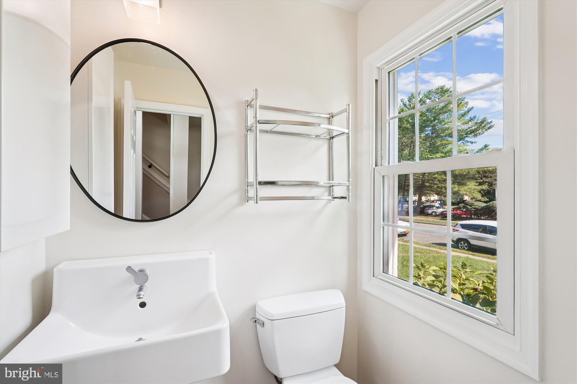 227 Dry Mill Road Southwest Leesburg, VA 20175 - Photo 7 of 38 a bathroom with a toilet a sink and a window