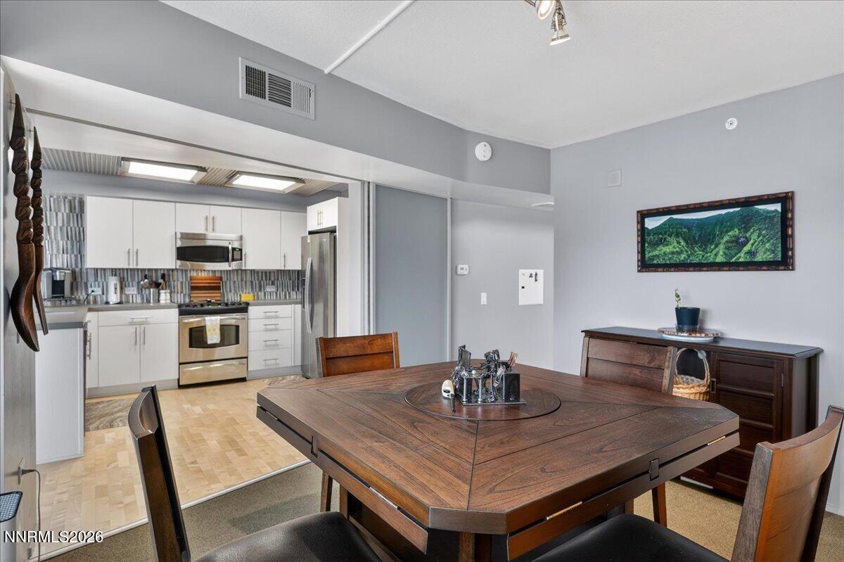 255 North Sierra Street, Unit S 1919 Reno, NV 89501 - Photo 15 of 42 a view of a dining room with furniture