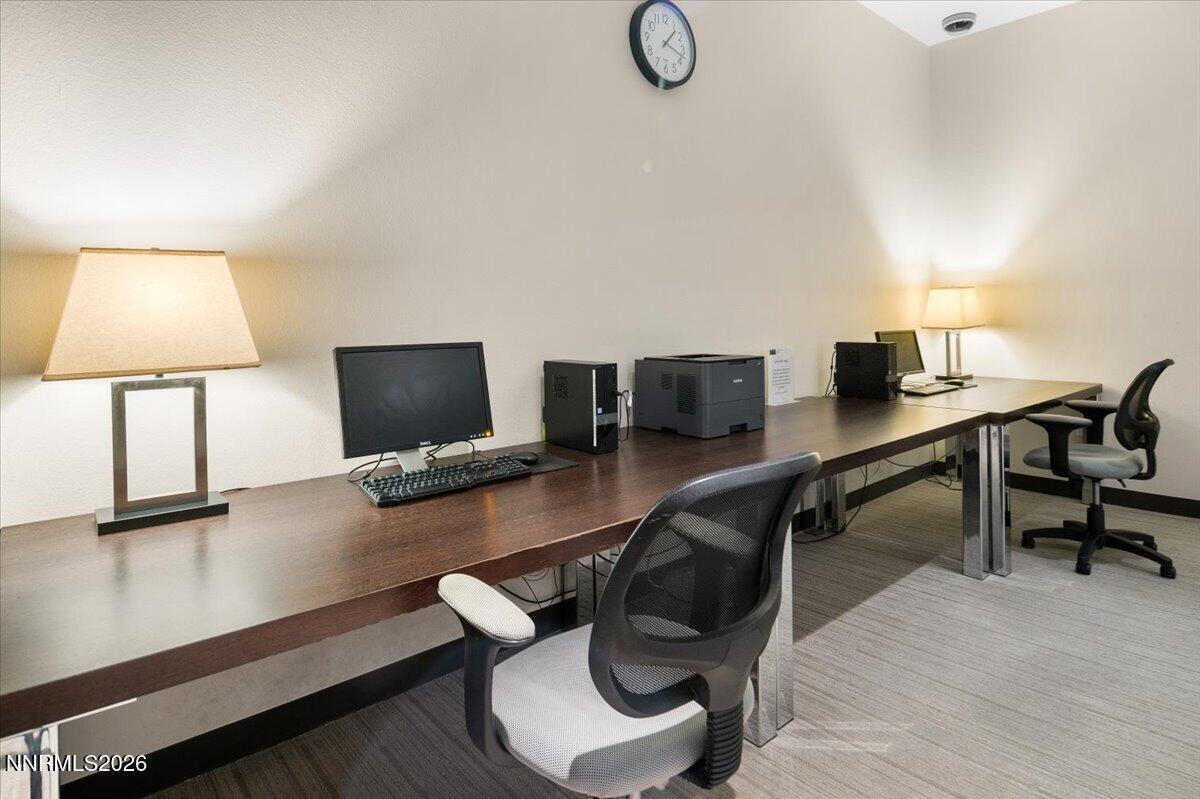 255 North Sierra Street, Unit S 1919 Reno, NV 89501 - Photo 40 of 42 a view of a workspace with furniture and a window
