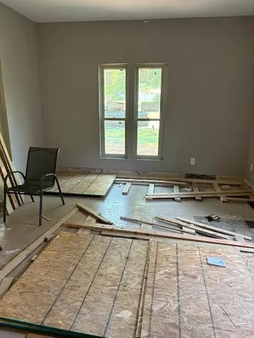 a view of a swimming pool and lounge chair