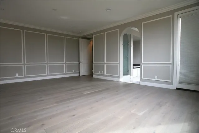 a kitchen with a refrigerator and a sink