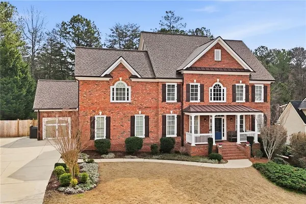 front view of house with a yard