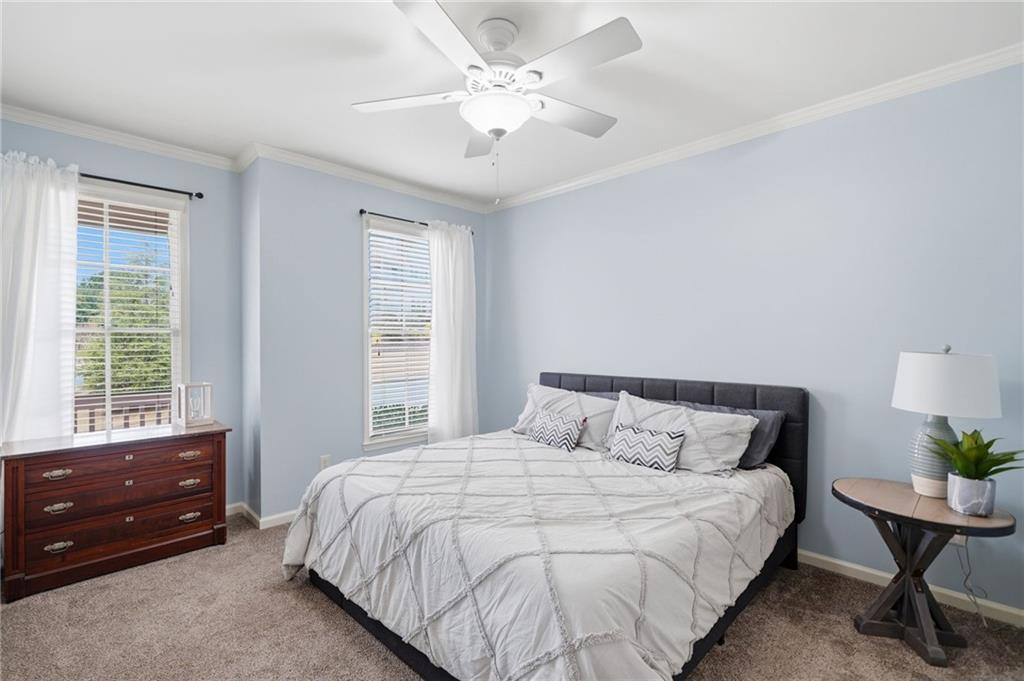 507 Blue Ridge Way Canton, GA 30114 - Photo 11 of 33 a bedroom with a bed and a window
