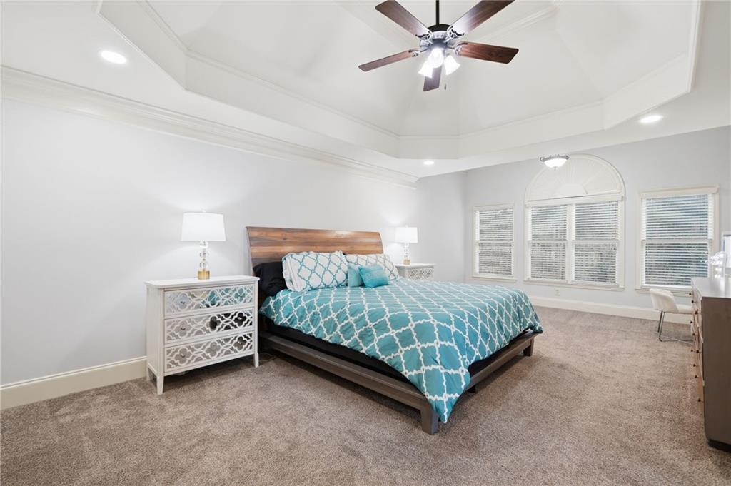 507 Blue Ridge Way Canton, GA 30114 - Photo 14 of 33 a bedroom with a bed and a large window