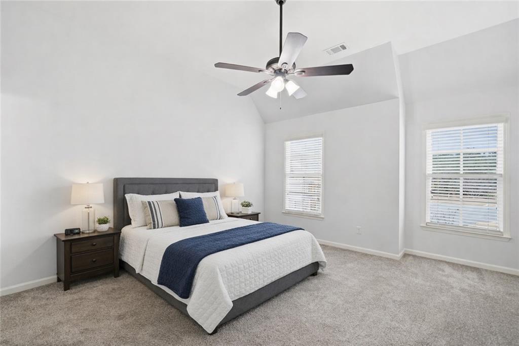 507 Blue Ridge Way Canton, GA 30114 - Photo 19 of 33 a bedroom with a bed and window