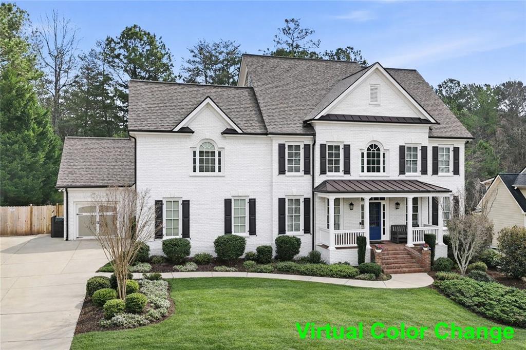 507 Blue Ridge Way Canton, GA 30114 - Photo 2 of 33 a front view of a house with a yard
