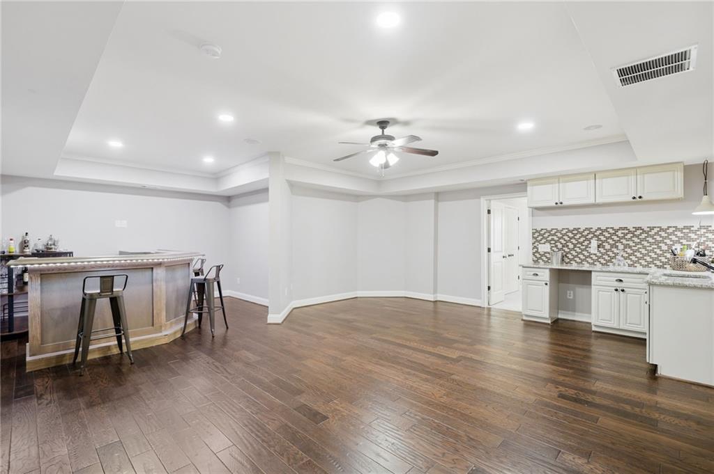 507 Blue Ridge Way Canton, GA 30114 - Photo 21 of 33 a view of kitchen with cabinets and wooden floor