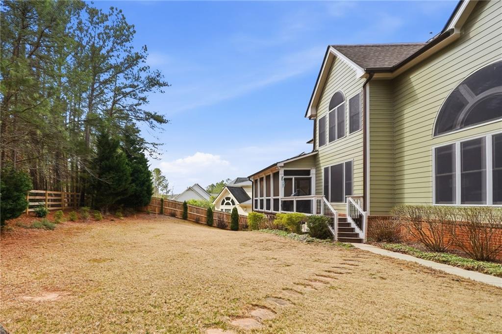 507 Blue Ridge Way Canton, GA 30114 - Photo 25 of 33 a view of a house with a yard